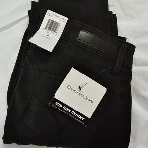 Nwt Calvin Klein mid rise skinny pants black Size 2